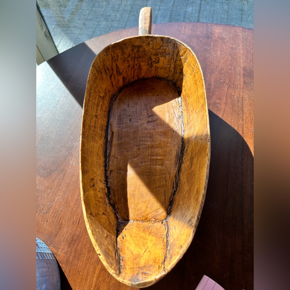 Wooden bowl/scoop. Primitive reproduction. 14.5” long 7” wide and 3” deep.